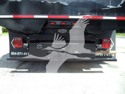 Dump truck bed rear showing Venco/Vergo bumper and taillights with stock numbers and contact on sides.
