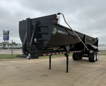Armor Lite SHD32/48 dump trailer showing black steel dump body and dual axle with landing gear in foreground.