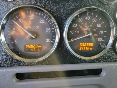 Instrument cluster of a 2019 Peterbilt 389 showing tachometer and speedometer with digital hour and mile readings.