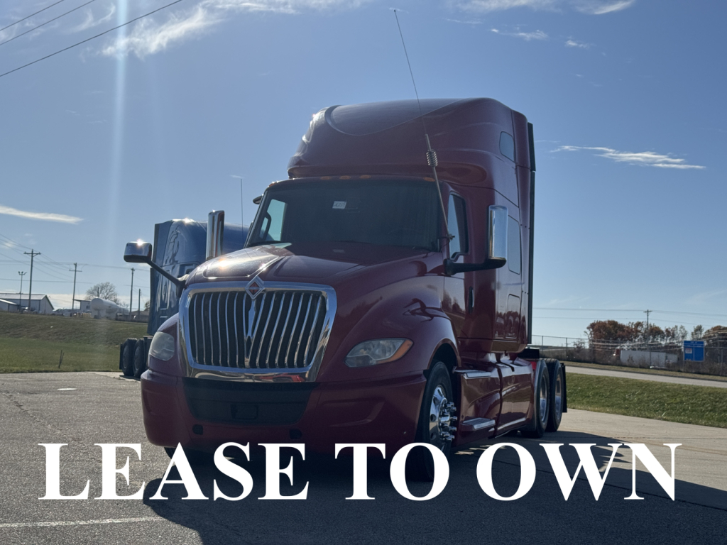 Truck front view showing maroon 2018 International LT625 sleeper cab with chrome grille and LEASE TO OWN text overlay.