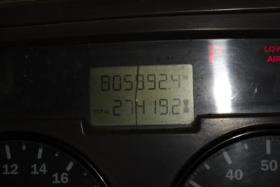 Dashboard display showing total miles 805,892.4 and total 271,419.2 on Mack CV Granite gauge cluster.