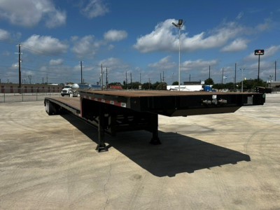 Drop deck trailer showing low-angle side view with tandem axles and open ramps, 53' length, black frame and deck.