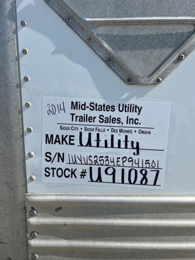 Sticker on trailer door showing 'Mid-States Utility Trailer Sales, Inc.' with serial number S/N U91087 and stock number U91087, VIN 1UYVS2534EP941501.
