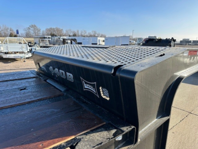 Side view of Landoll 440B trailer neck with perforated deck and embossed '440B LANDOLL' marking.