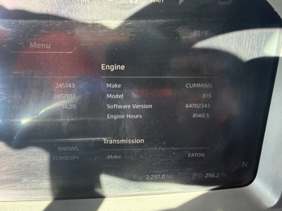 Kenworth T680 engine bay display showing Cummins X15 engine details, software version, engine hours, and transmission info.