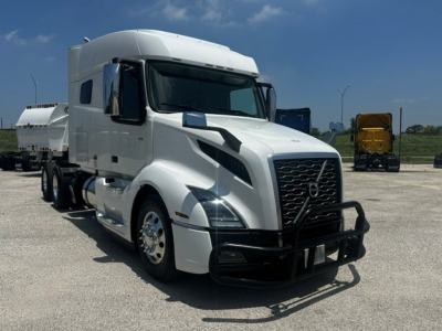 Volvo VNL64T740 sleeper tractor showing front grille, bumper guard, and side mirrors