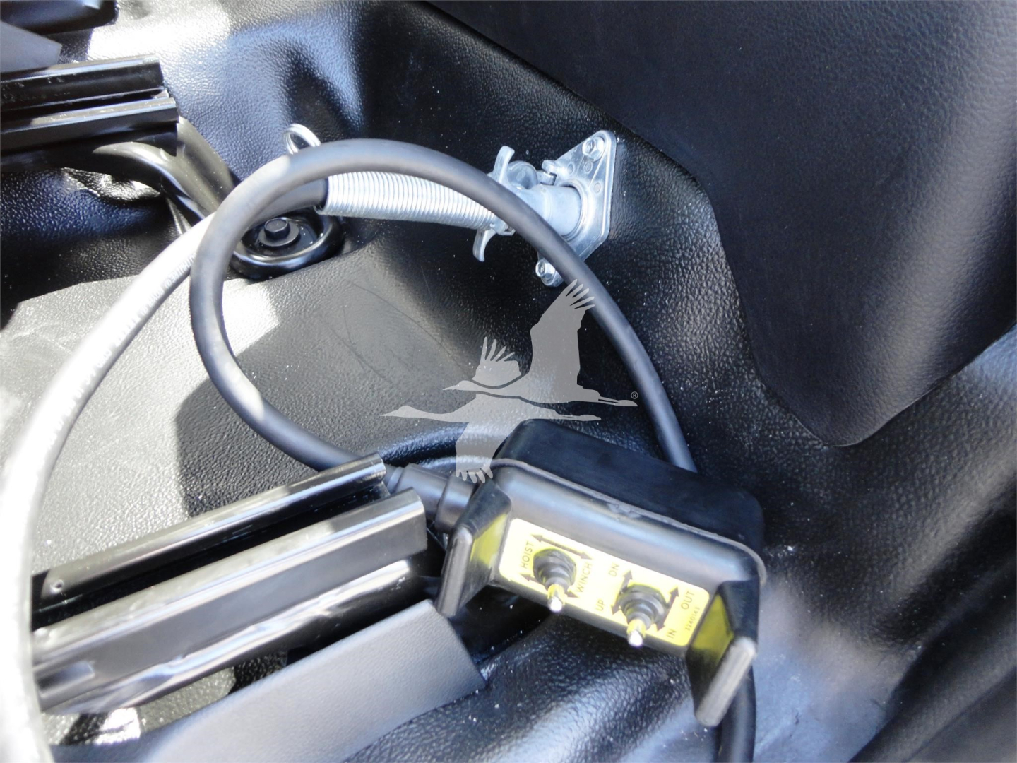 Ram 5500 Hooklift truck interior showing wiring harness and switch panel along with mounting hardware.