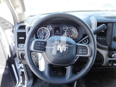 Ram 5500 HD truck interior steering wheel and dashboard view showing gauges and controls.