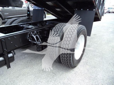 Peterbilt 337 truck rear wheel and suspension view showing dual rear tires and chassis components.