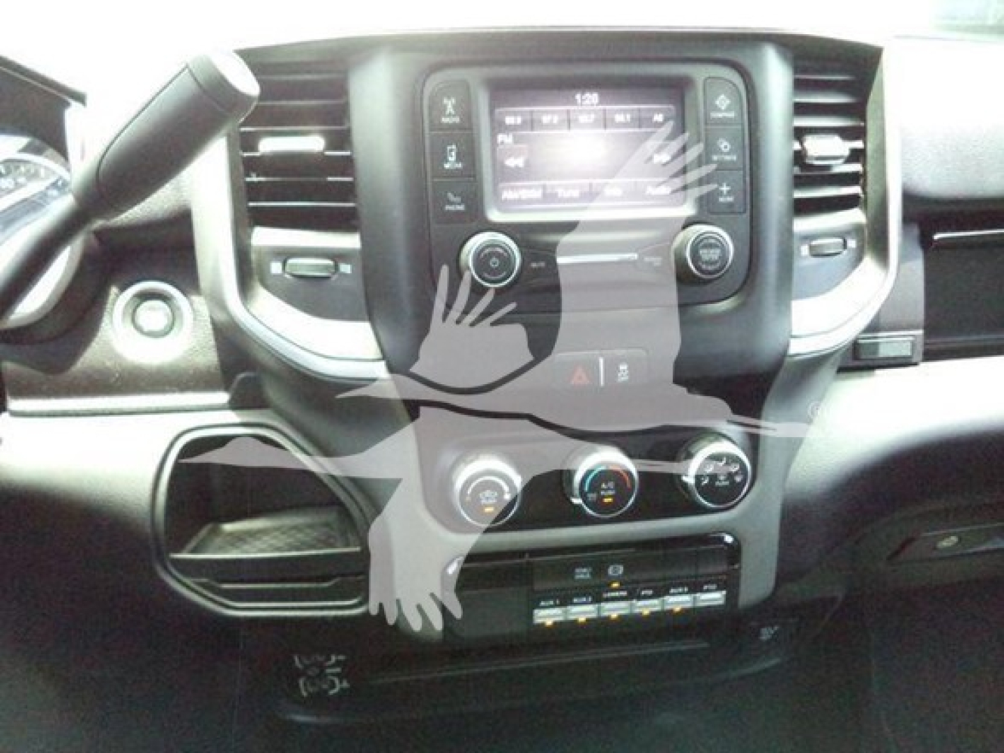 Ram 4500 dash and center console showing touchscreen display and climate controls.