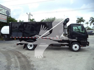 2019 Hino 195 roll-off truck side view showing cab and long black dumpster body with hydraulic arm.