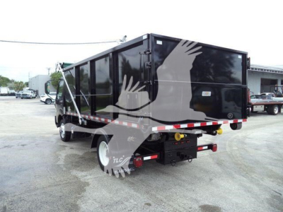 2019 Hino 195 roll-off truck showing rear and side with black dump body and white wheels.