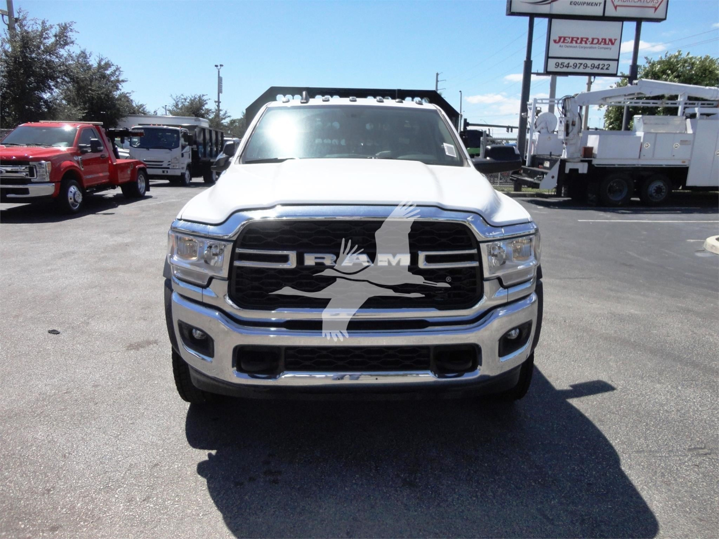 Ram 5500 HD truck front view showing chrome grille and bumper.