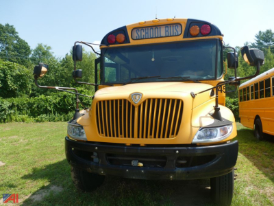 School bus front view showing yellow 2019 International CE 3000 with 'SCHOOL BUS' sign, grille, headlights, and bumper.