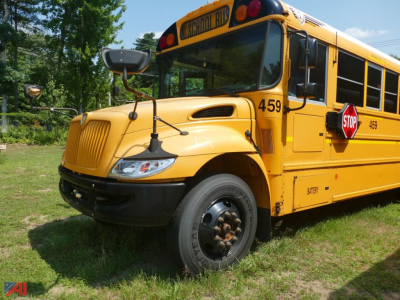 2019 International CE 3000 school bus side/front view showing bus number 459, stop sign, and 'SCHOOL BUS' sign on top; yellow body, round headlight area, front grille.