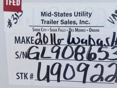 Mid-States Utility Trailer Sales sign on trailer showing VIN and stock number; handwritten 2016 Wabash trailer details and S/N GL908653 U90922.