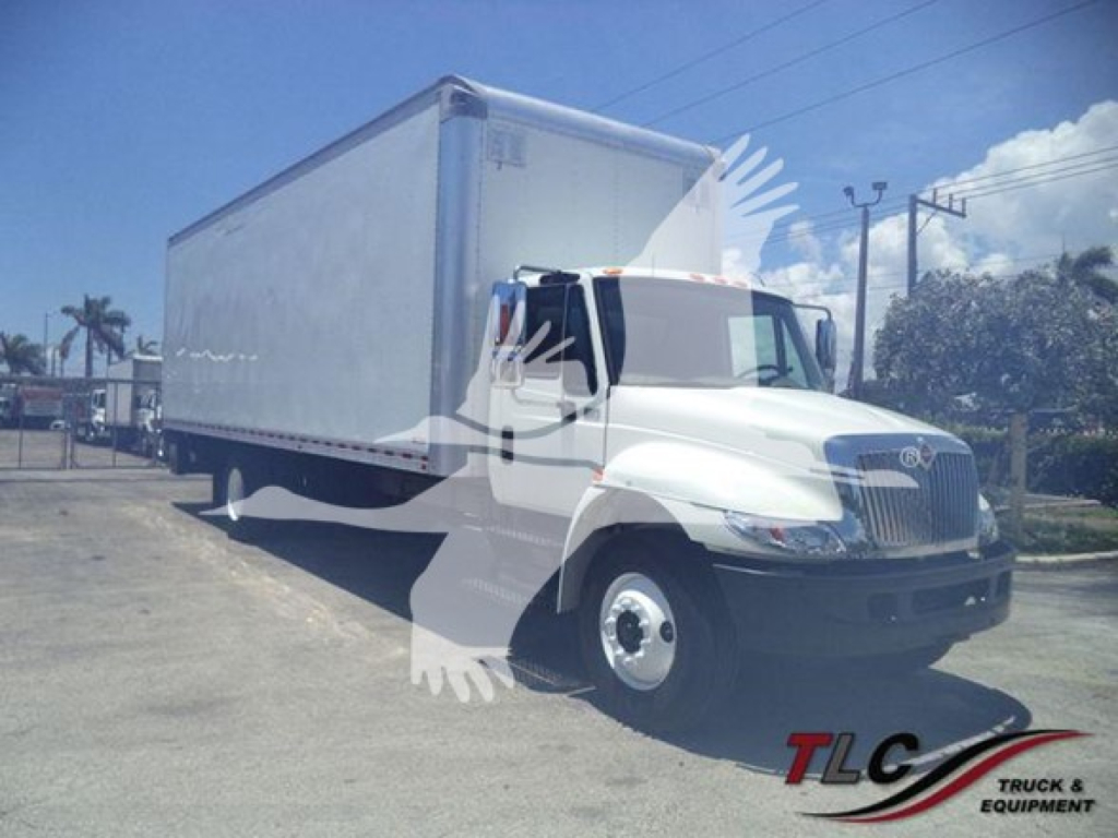 Truck front-side view of a 2019 International Durastar 4300 box truck with white cab and large box body.
