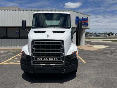 Front view of a white 2027 Mack AN64T conventional daycab truck showing bold grille and MACk lettering on the bumper.