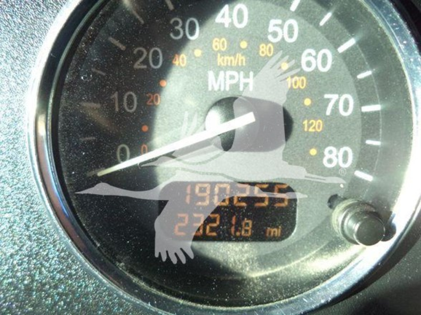 Dashboard speedometer from a Peterbilt 337 showing mph 0-80 scale with odometer and trip meters visible.