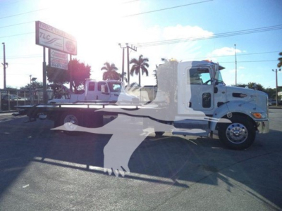 Peterbilt 337 rollback truck in side view, white/gray color, VIN 2NP2HM6X2LM718971, stock T18971, used.