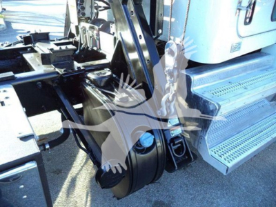 Peterbilt 337 rollback truck rear showing hydraulic system and steps with metal staircase.