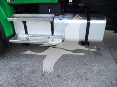 Fuel tank and chrome running board steps on the side of a 2015 Freightliner M2 106 truck.