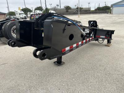 Load King SB141/2-43 trailer with black steel frame and hydraulic system, side rails, and undercarriage in a parking lot.