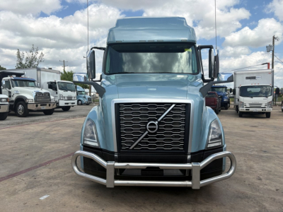 Volvo VNL64T760 truck front view with chrome bull bar and grille exhibiting Volvo emblem.