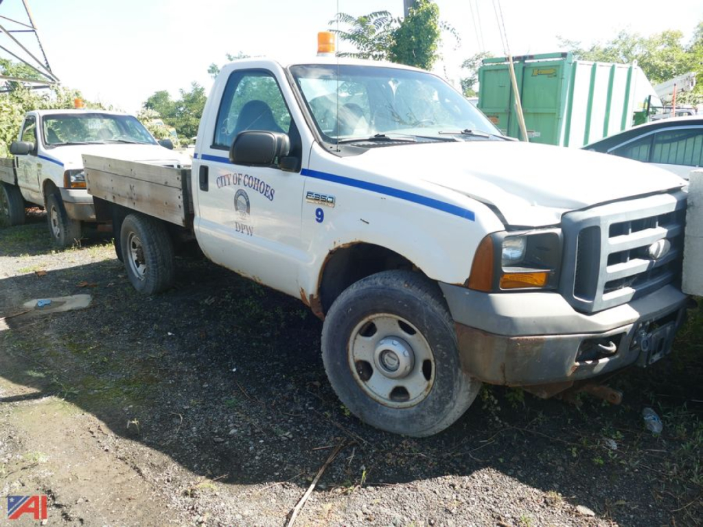Ford F-350 Super Duty single rear wheel utility truck showing front grille, side decal, and cargo bed.