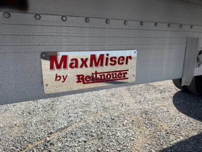 MaxMiser by Reitnouer sign on trailer side showing MaxMiser by Reitnouer plate.