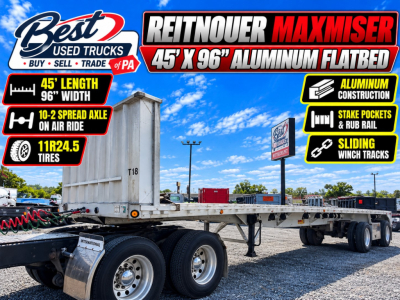 Flatbed trailer showing 45' length and 96" width, MaxMiser aluminum flatbed by Reitnouer, with dual rear axles and visible branding.