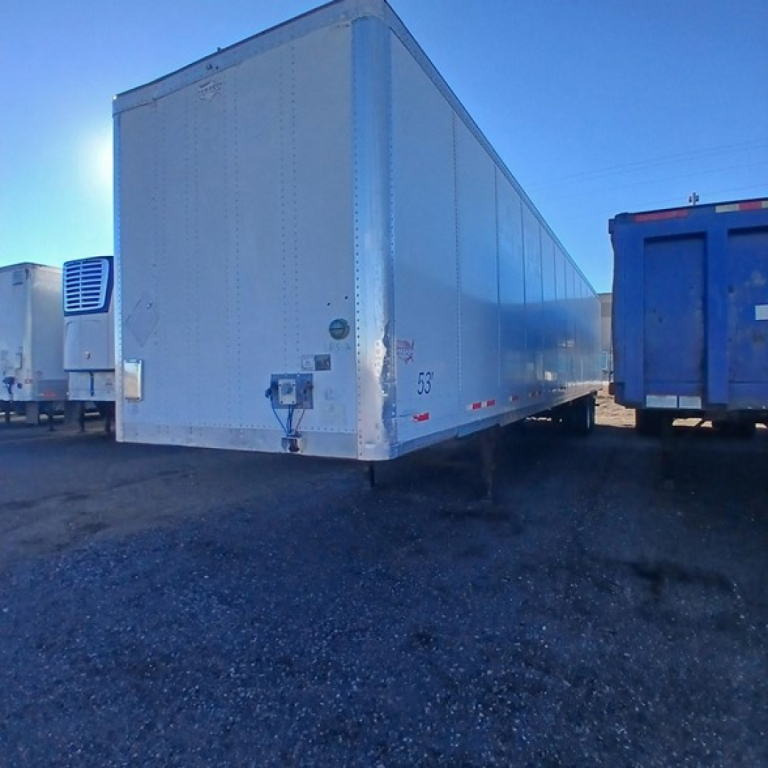 Trailer side and rear of a 2014 Wabash air ride dry van showing plain aluminum exterior and rear doors.