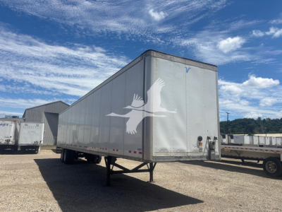Trailer front-right view of a Vanguard VXP box trailer with a white bird graphic on the side and a V logo on the front corner.