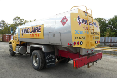 Truck fuel service tanker with Sinclair Fuel Oils branding, diesel fuel, 1993 hazard diamond, rear view showing storage tank and bumper