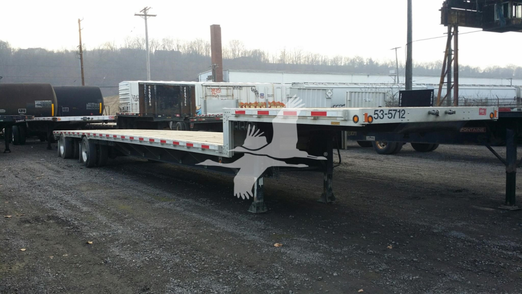 Trailer deck shows a Doonan combo drop trailer with a white bird graphic, flatbed structure, and landing gear visible.