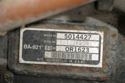 Label plate on component showing Bendix No. 5014427 and serial numbers with MFG by BCVS LLC in USA.