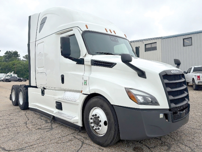 Freightliner Cascadia126 tractor-trailer cab showing front grille, windshield, and side mirrors. No visible text on the exterior components.
