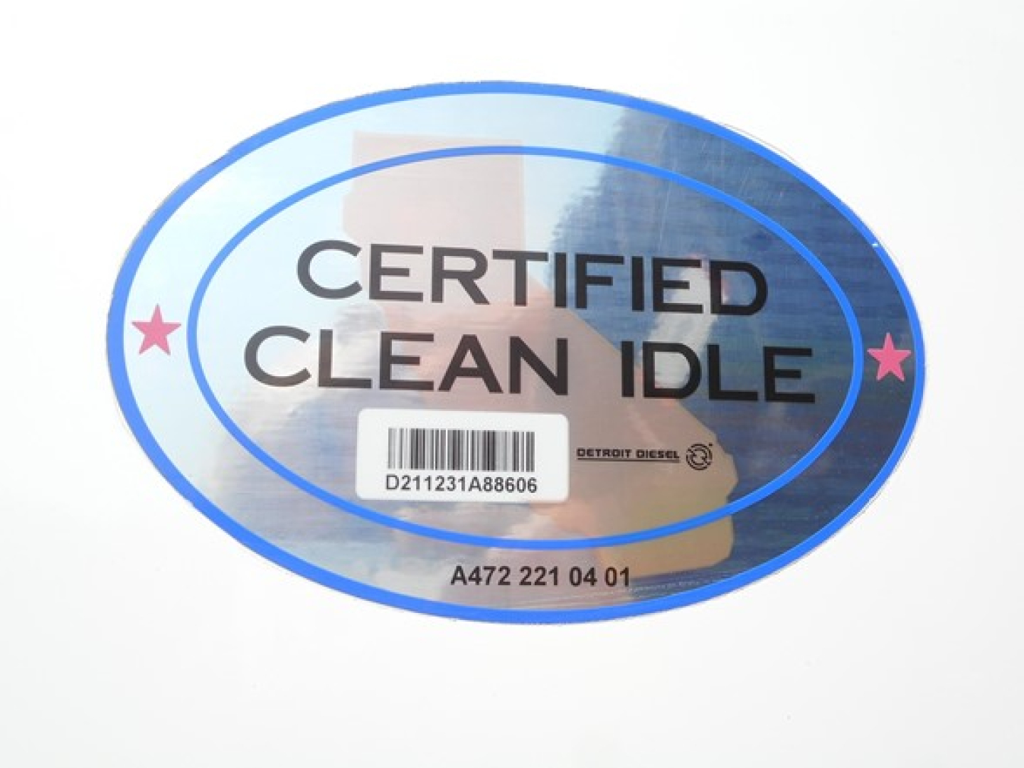 Sticker label reading CERTIFIED CLEAN IDLE with barcode and Detroit Diesel icon.