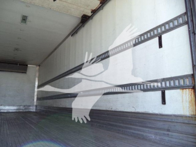2019 Hino 268a refrigerated truck interior viewed from cargo area showing side rails and metal floor.