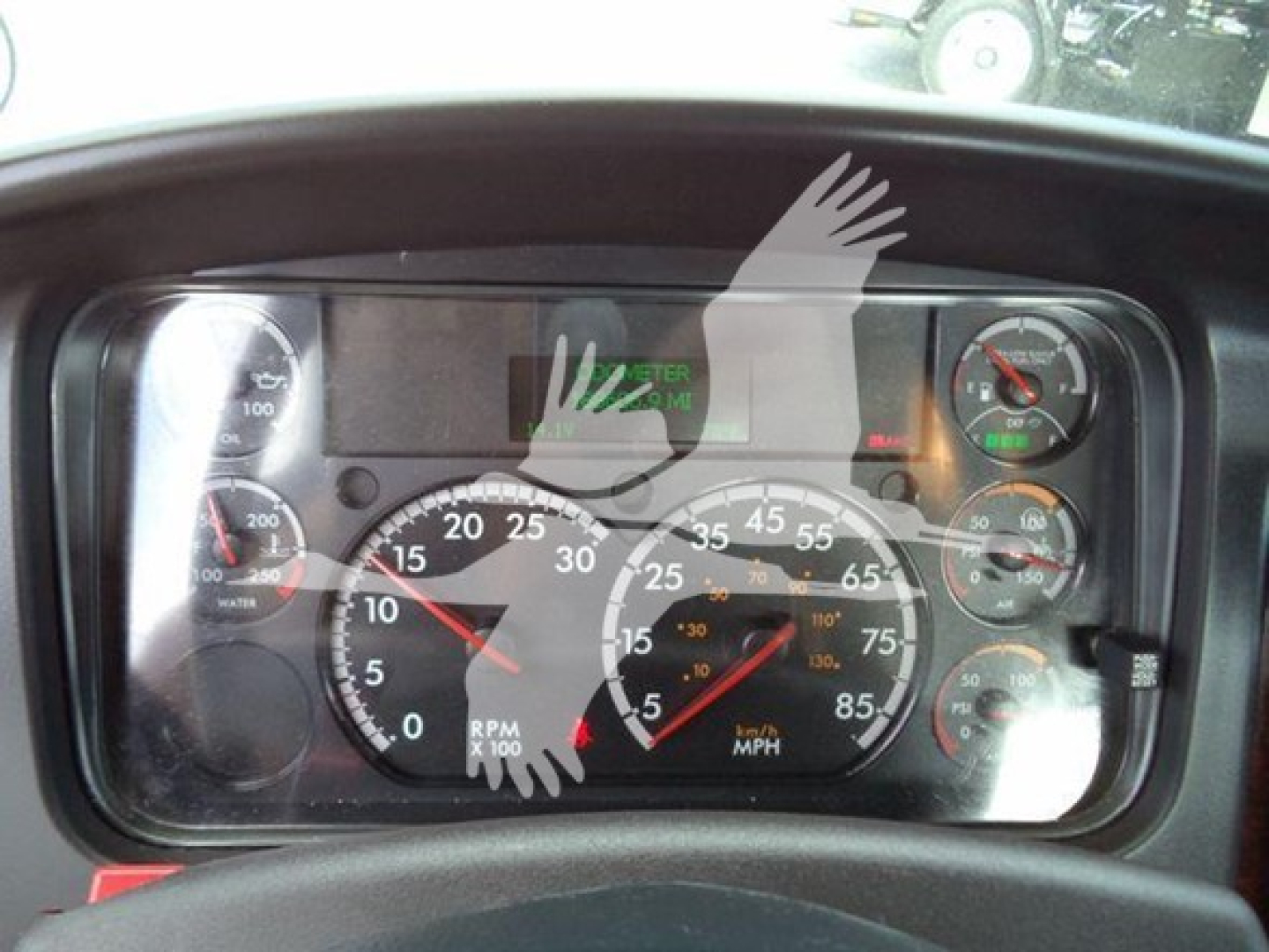 Dashboard of a 2019 Freightliner Business Class M2 106 showing instrument cluster with RPM, speedometer, and gauges.