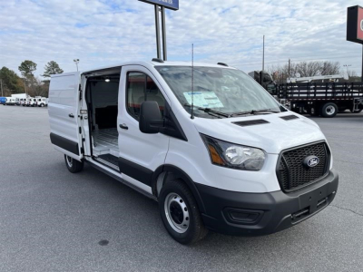 Ford Transit cargo van with side sliding door open, white exterior, black front grille, visible cargo area interior.