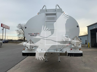 Rear view of a 2014 Heil trough bottom petro tank trailer showing rear doors, ladders, and support legs.