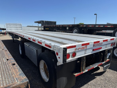 Fontaine 48' spread air combo flatbed trailer showing aluminum deck and rear lights.