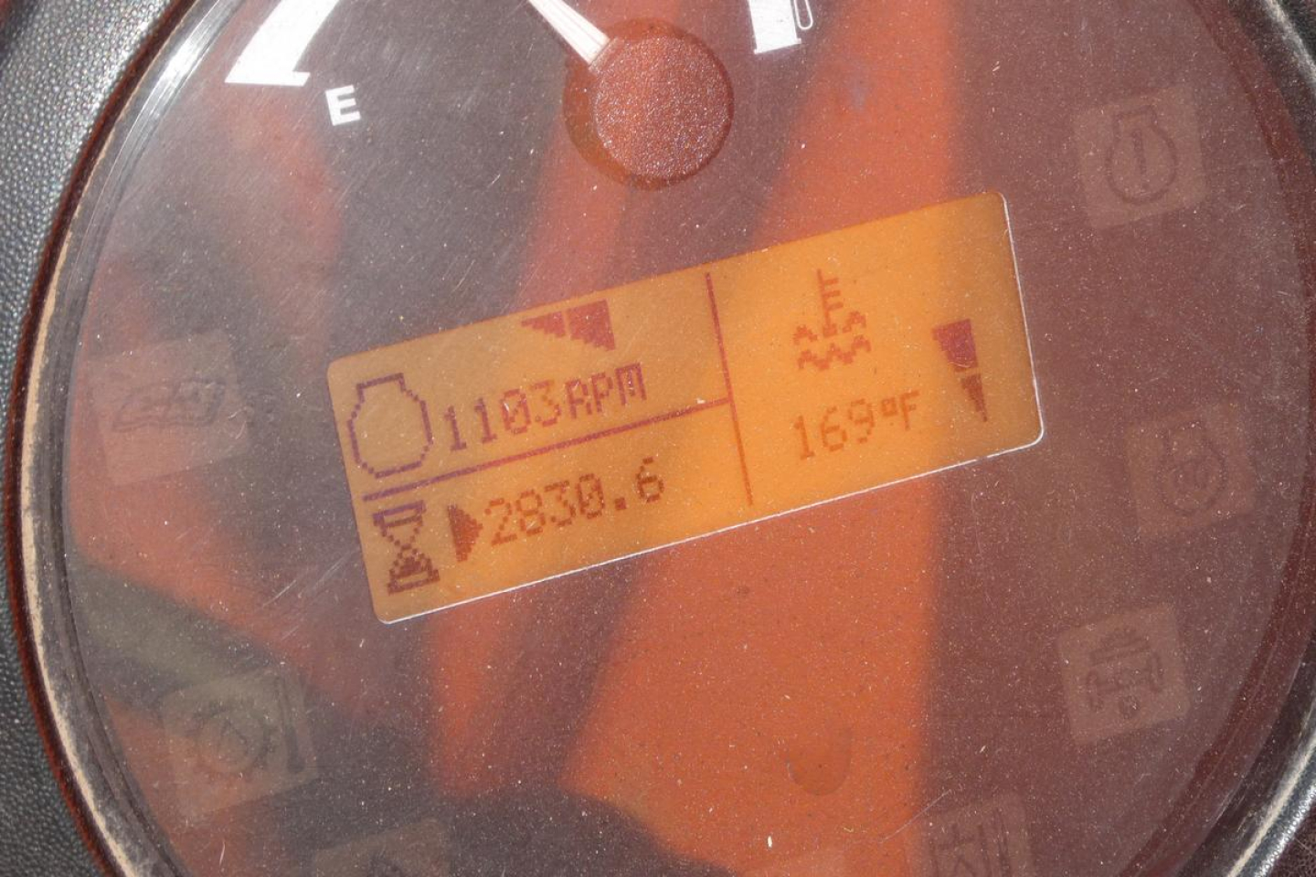 JLG 8042 telehandler gauge cluster showing 1183 RPM, 2830.6 hours, 169°F coolant temp, and hour meter readout.