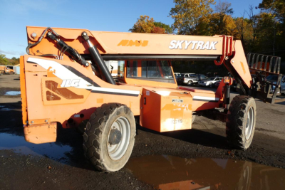 JLG SkyTrak 8042 telescopic boom lift in orange, side view showing oversized tires and lift arm with hydraulic cylinders.