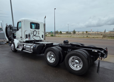 Kenworth T880 tractor in white, side view showing cab and chassis. No text visible on components in view.