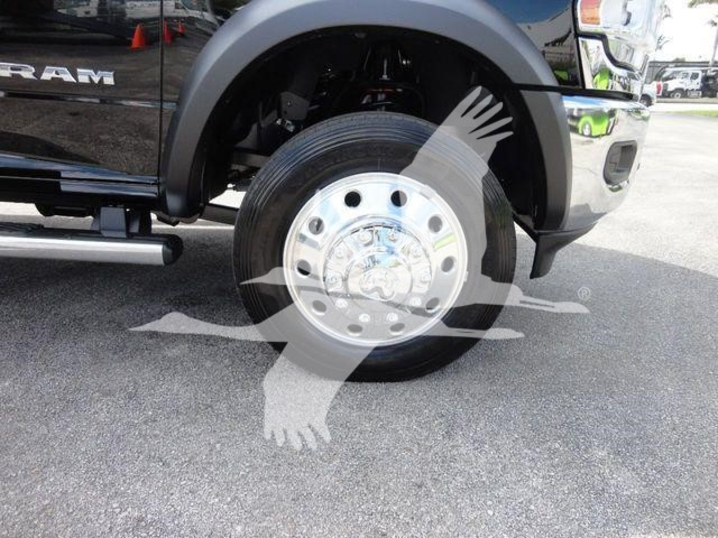 Ram 4500 SLT front wheel with chrome hubcap and tire, part of truck side view; appears to be new.