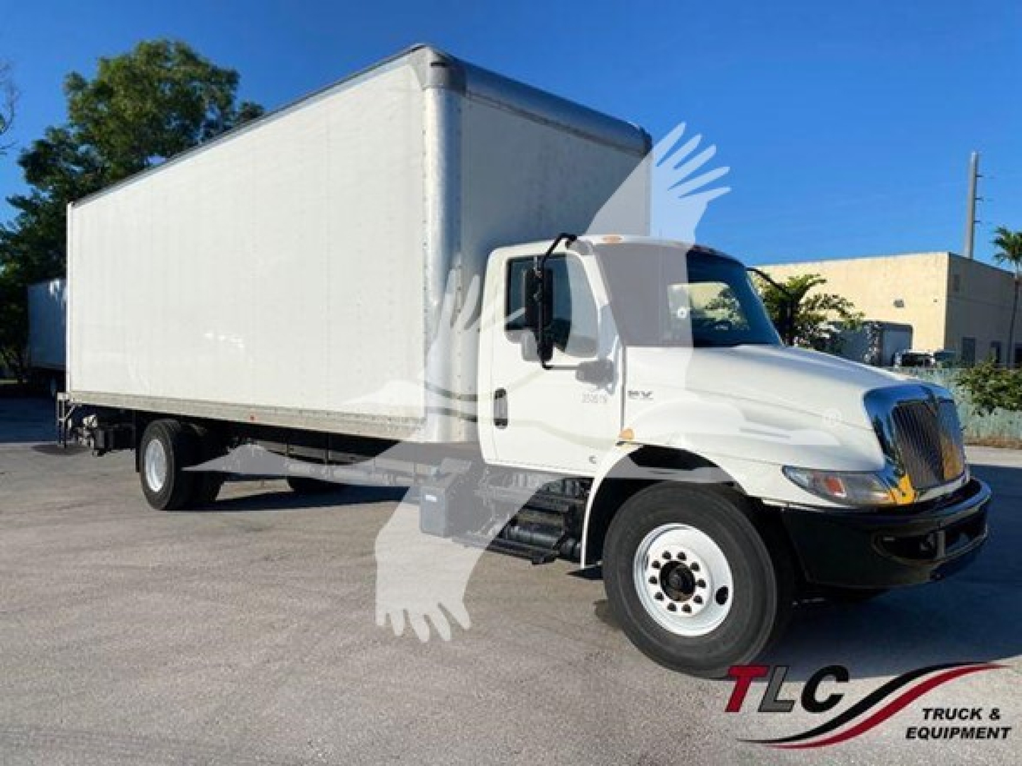 Box truck from side showing white 2020 International MV cab and box with VIN 3HAEUMML3LL207913 and stock number T07913.