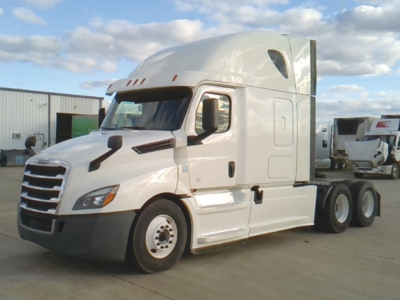 Freightliner Cascadia 126 sleeper cab truck in profile view with white body.