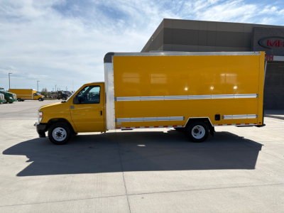 Box truck side profile with yellow cargo box and cab, Ford E350, VIN 1FDWE3FNXNDC04056, stock 0631407, cutaway/ high cube body